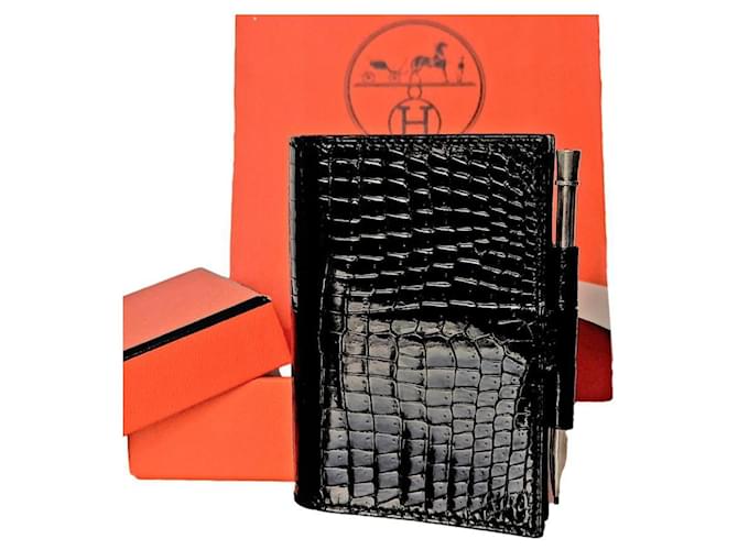 Hermès. Couverture d'agenda PM cuir crocodile Porosus noir. Cuirs exotiques  ref.632100