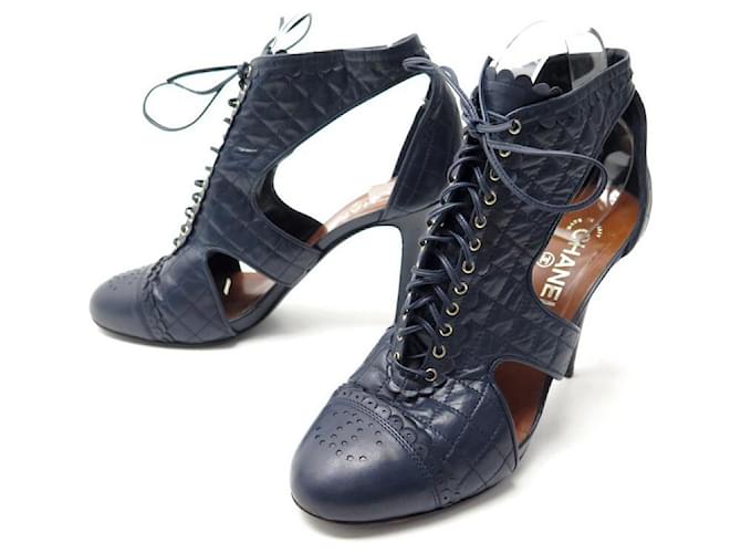 SHOES ANKLE BOOTS CHANEL LOGO CC BLUE QUILTED LEATHER 40 LOW BOOTS SHOES Navy blue  ref.636987