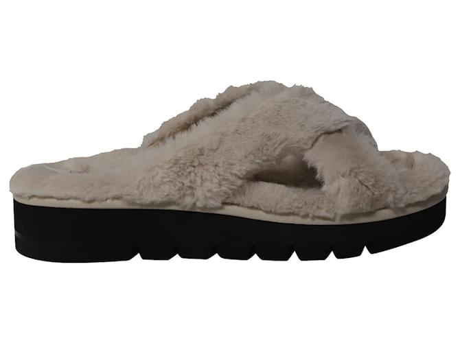 Stuart Weitzman Roza Lift Slides Sandalen aus cremefarbenem Kunstpelz Weiß Roh Synthetisch  ref.637691