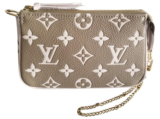 Louis Vuitton Pochette Accessory Monogram Empreinte Leather Wristlet Bag  Flesh  ref.641354