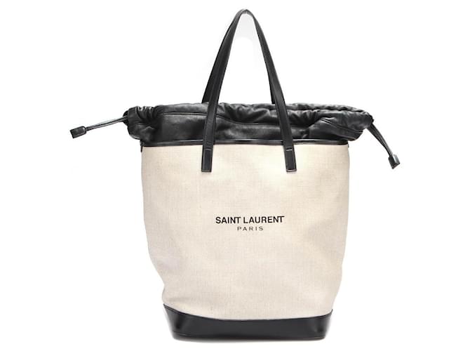 Yves Saint Laurent Einkaufstasche aus Canvas und Leder mit Kordelzug Weiß Leinwand  ref.650222