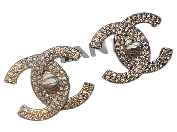 Chanel-Kostüm-Ohrringe Silber