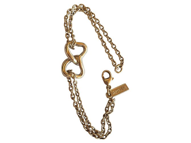 Yves Saint Laurent Pulsera corazón de plata maciza 925