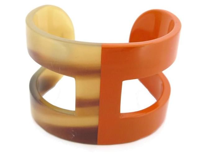 Hermès HERMES MANSCHETTENARMBAND FORM H AUS BÜFFELHORN UND ORANGE LACKARMBAND Vergoldet  ref.658001