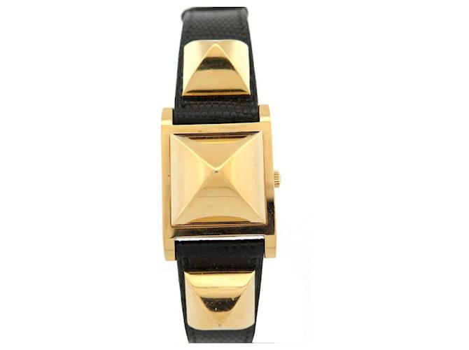Hermès HERMES MEDOR WATCH 23 MM QUARTZ IN GOLD PLATE AND BLACK LIZARD LEATHER WATCH Golden Gold-plated  ref.658050