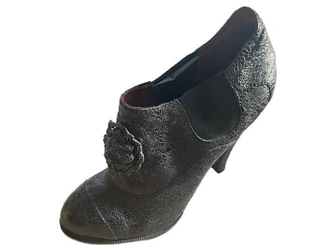 Cambon chanel boots camelia flower black Cuir Noir  ref.658336