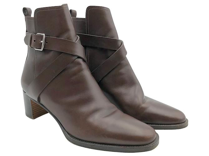 Hermès ankle boots in brown leather with buckled ankle cross strap  ref.659224