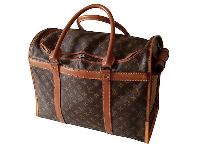 Louis Vuitton Dog bag in Monogram canvas and leather Dark brown Cloth  ref.662937 - Joli Closet