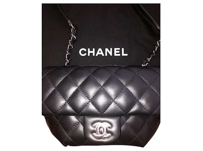 Chanel Clutch bags Black Leather  ref.671889