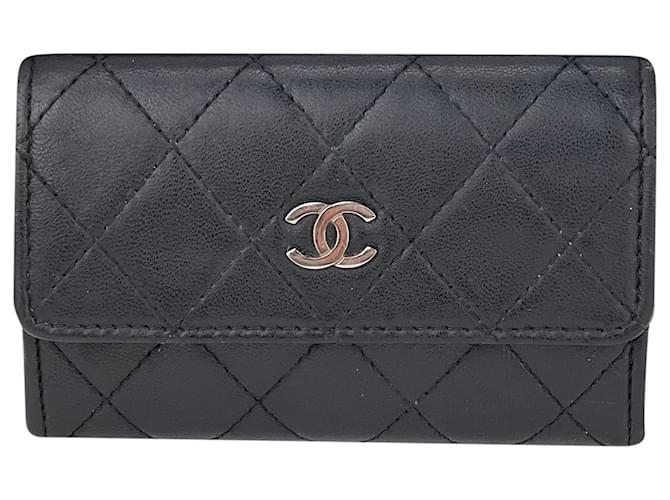 Chanel Wallet Classic Flap Quilted Black Lambskin Mini Wallet Tarjetero de segunda mano Negro Cuero  ref.674081