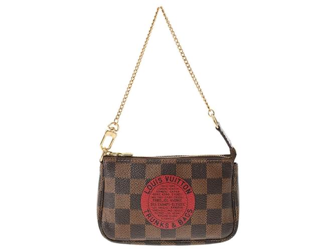 Pochette accessoire cloth handbag Louis Vuitton Brown in Cloth