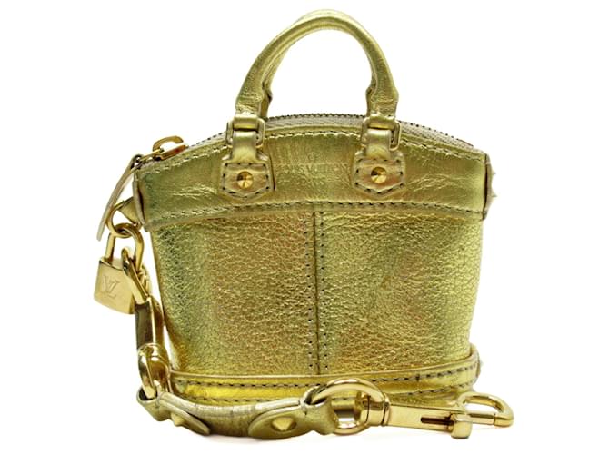 Louis Vuitton Porte clés Golden Exotic leather  ref.674391