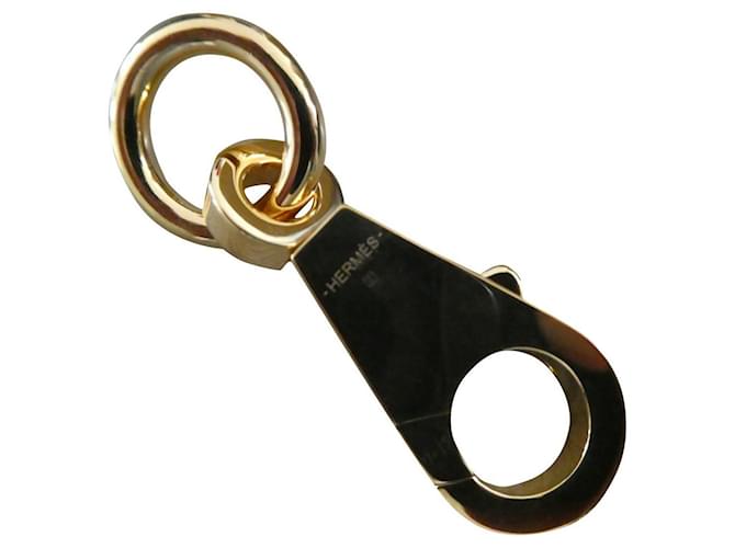 Hermès carabiner in new gold-plated steel Gold hardware  ref.674519