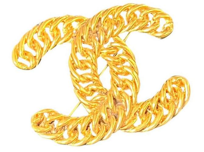 Chanel Alfileres y broches Dorado Metal  ref.689186