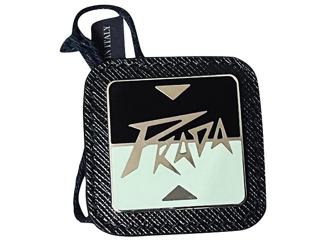 Spilla Prada in pelle Saffiano e acciaio nero verde