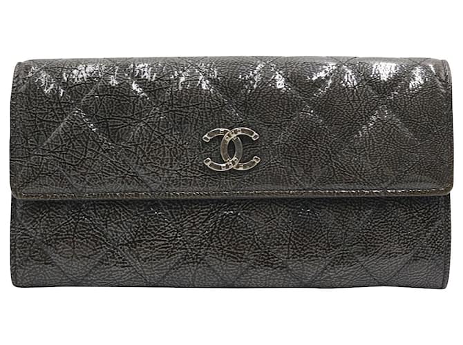 Chanel Quilted Flap Wallet aus schwarzem Kaviarleder  ref.695854