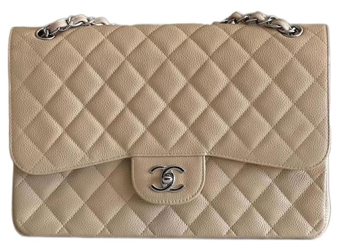 Timeless Chanel Jumbo Bege Couro  ref.697401