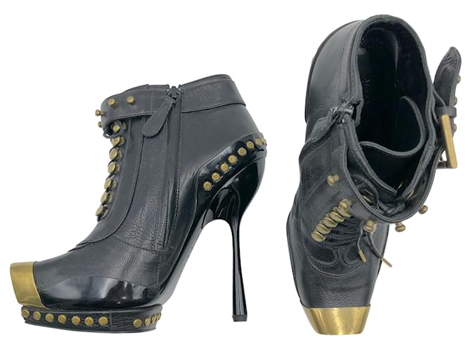 Alexander McQueen ankle boots in black leather with brass square toe caps  ref.698444