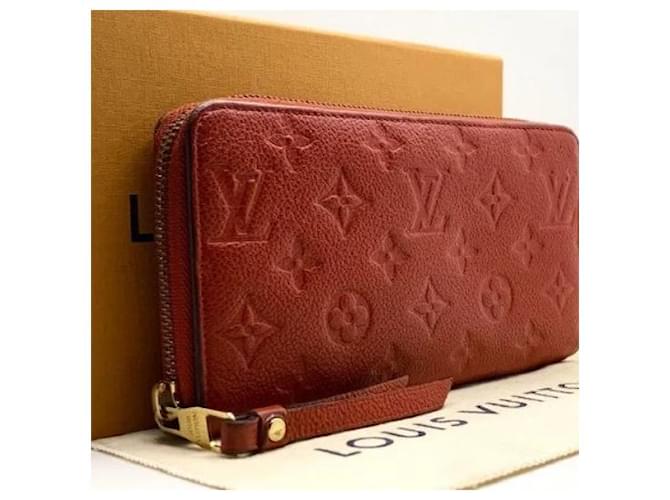 Autentico portafoglio lungo pochette monogramma Louis Vuitton Rosso Pelle  ref.701981