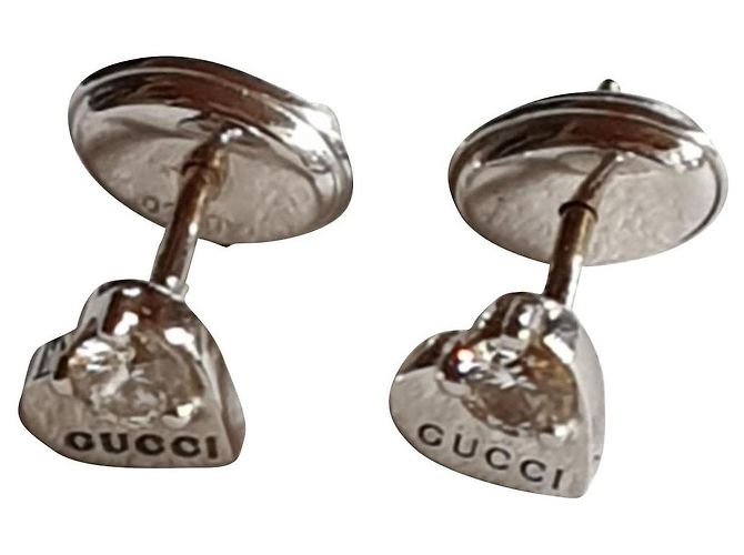 Gucci cœurs or blanc 750/000 et diamants