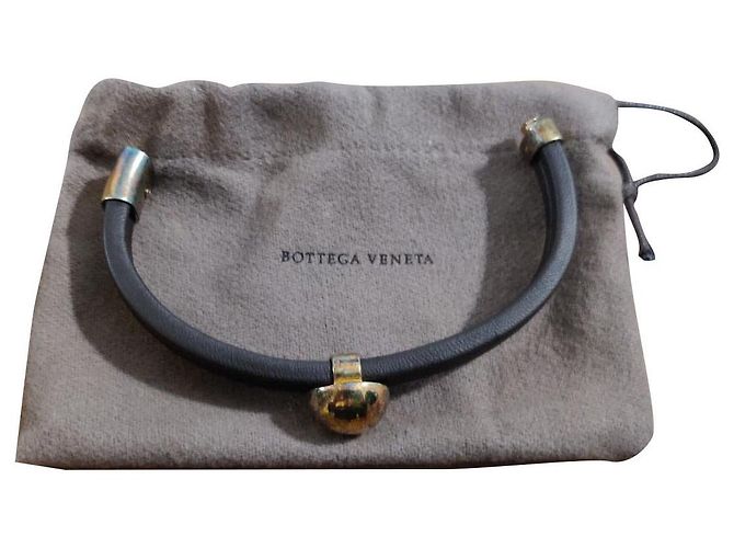Bracciale Bottega Veneta in pelle nera e oro Nero D'oro