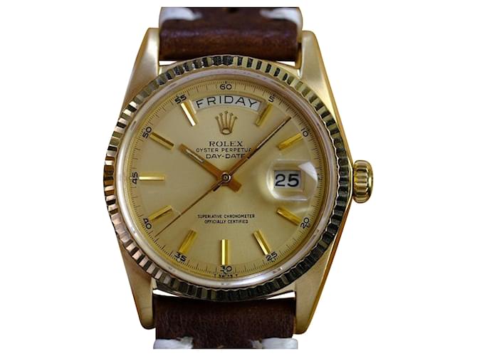 Date du jour Rolex 1803 Cadran Champagne d'usine 18k or sur un bracelet en cuir Jaune  ref.706615