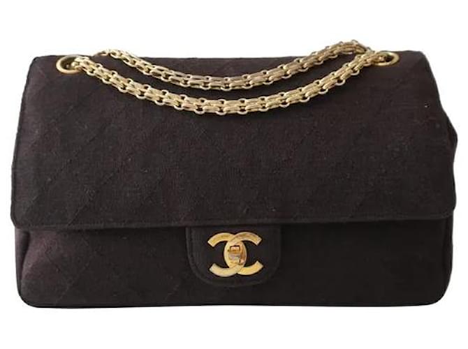 Echtes Chanel-Sammlerstück! Chanel früh 1980's Vintage Medium Timeless Classic gefütterte Überschlagtasche aus gestepptem Baumwolljersey in Dunkelbraun mit beigefarbener Lederinnenausstattung Baumwolle  ref.708059