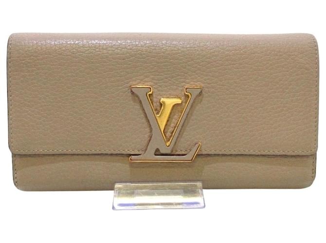 Louis Vuitton Portefeuille Capucines Beige Leder  ref.710121