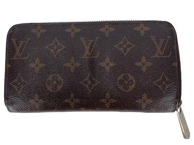 Braune Louis Vuitton Geldbörse aus beschichtetem Segeltuch Leinwand  ref.719061