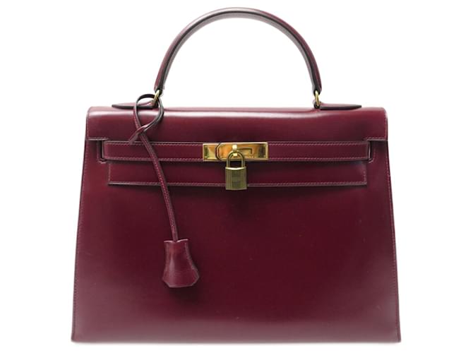 Hermès VINTAGE HERMES KELLY HANDBAG 32 RED BOX LEATHER SADDLER + HAND BAG BOX Dark red  ref.722038