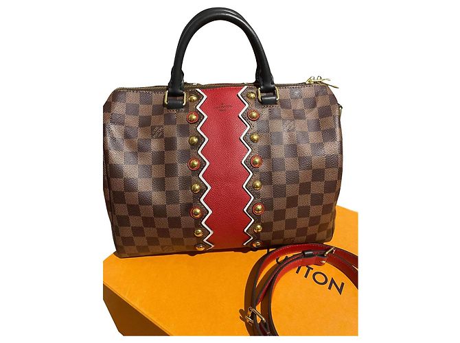 Bolsa de mão Louis Vuitton Karakoran em couro
