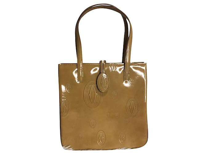 Cartier Handbags Beige Patent leather  ref.730351