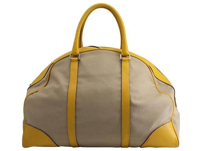 Prada Reisetasche Duffle aus gelbem und beigem Segeltuch Mehrfarben Leinwand  ref.730446