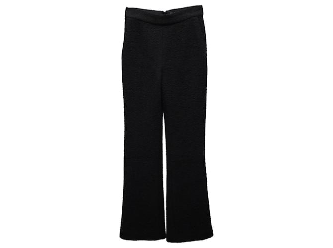 Pantalones acampanados Chanel en lana bouclé negra Negro  ref.730461