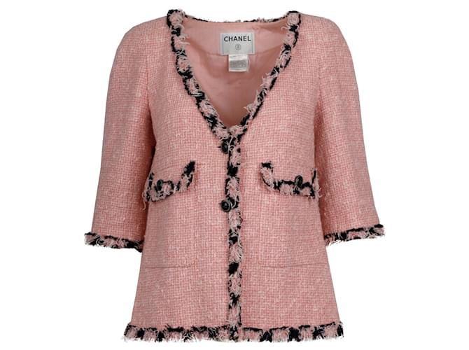 Conjunto de minivestido y chaqueta de bouclé rosa de Chanel  ref.731263