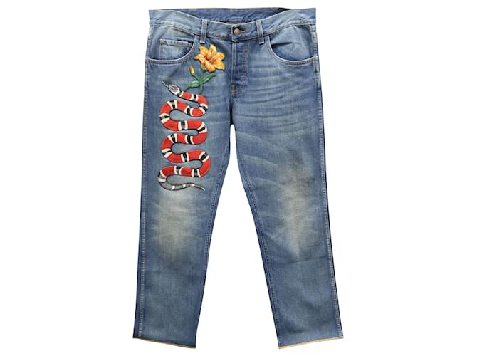 Gucci Jeans mit schmal zulaufendem Bein und Schlangenapplikation aus blauem Denim John  ref.739894