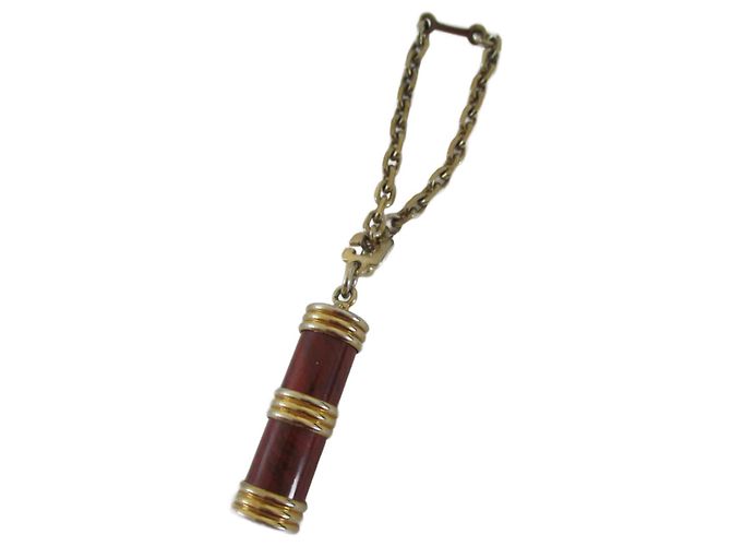 Yves Saint Laurent Amuleto de bolsa / chaveiro. Gold hardware