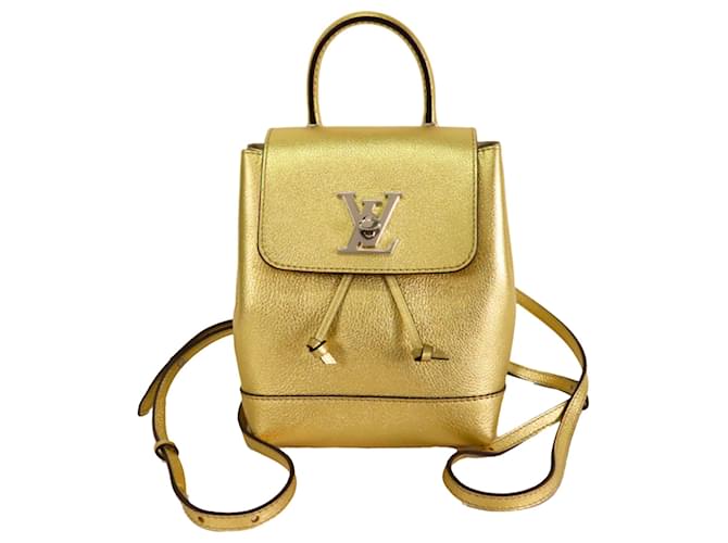 Louis Vuitton Gold Mini Lockme Backpack Golden Leather Pony-style calfskin  ref.743212 - Joli Closet