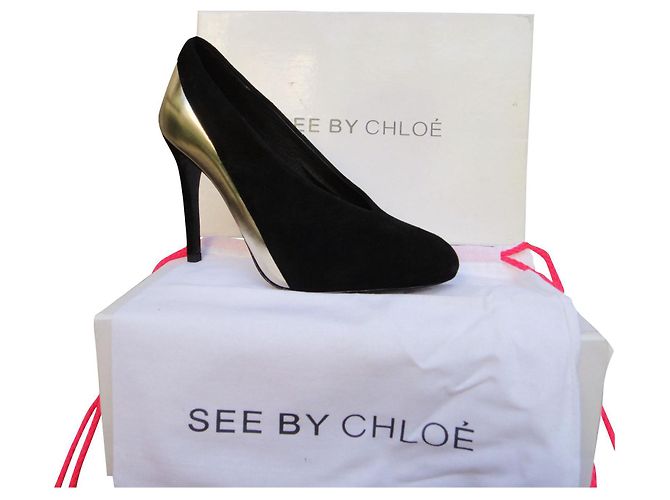 See By Chloé p pumps 37 New condition Black Golden