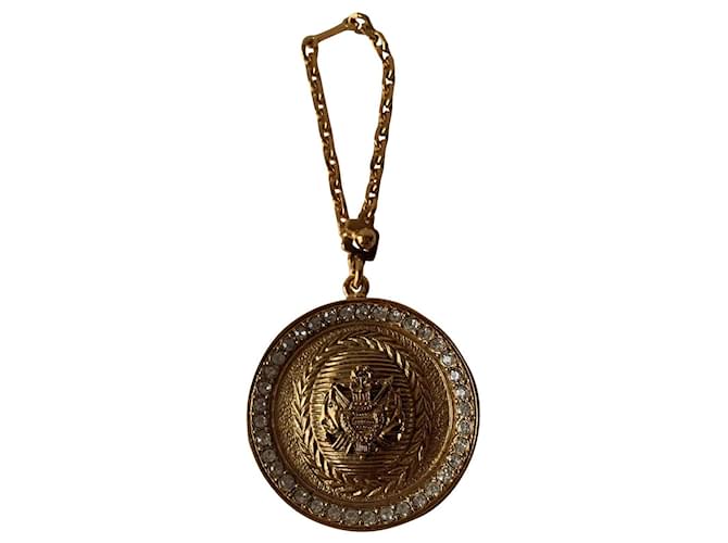 Christian Dior Encantos de saco Dourado Metal  ref.746526
