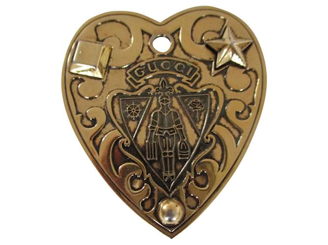 Gucci Bag charm / key ring. Crest Armored Knight. Golden Metal  ref.746529