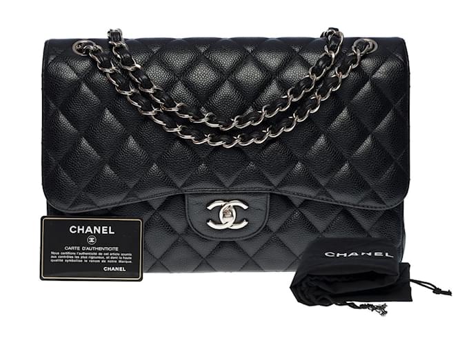 Prächtige Chanel Timeless Jumbo gefütterte Klapphandtasche aus schwarzem gestepptem Kaviarleder  ref.758843