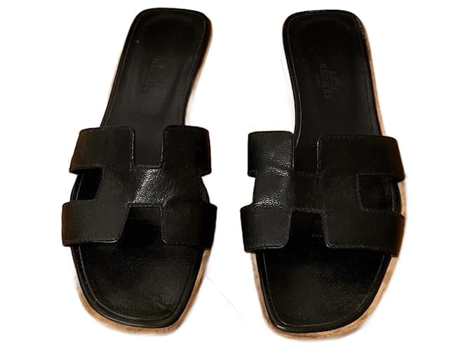 Oran Hermès Des sandales Cuir Noir  ref.760801
