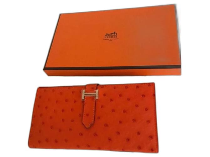 Béarn Hermès Nouveau portefeuille en cuir d'autruche Hermes Bearn Cuir autruche Orange  ref.761074