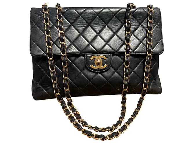 Chanel Handtaschen Schwarz Gold hardware Lammfell  ref.763745