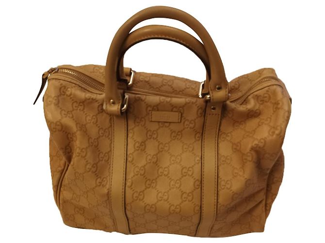 Bolsa de mão Gucci em couro bege com logo