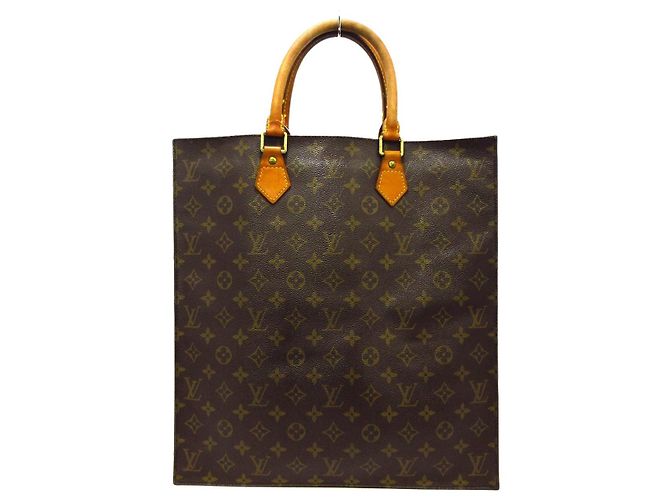 Louis Vuitton Sac plat Marrom