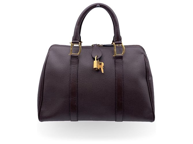 Dior Bolsa de mão com piercing de couro marrom
