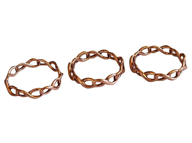 Tiffany & Co 3 bagues Infinity en Rubedo Metal Rose