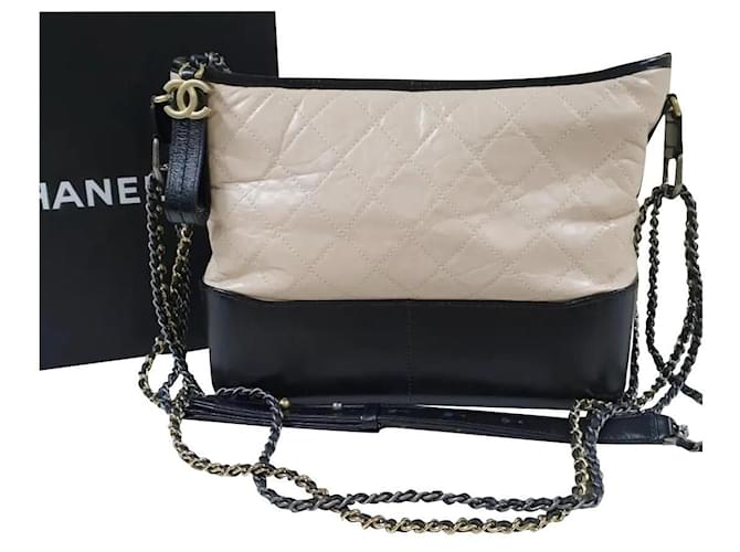 CHANEL Gabrielle 'Hobo' Bag in Aged White Quilted Leather and Black Leather